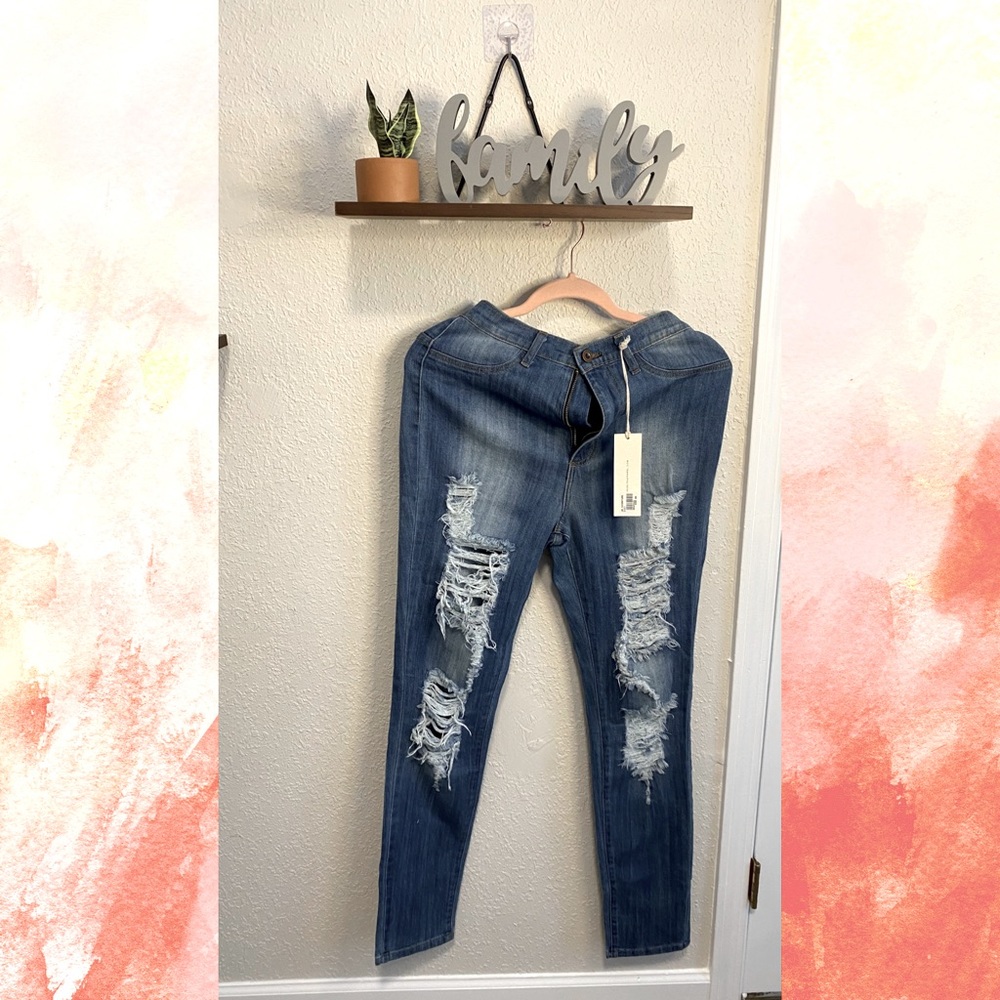High waisted distressed jeans